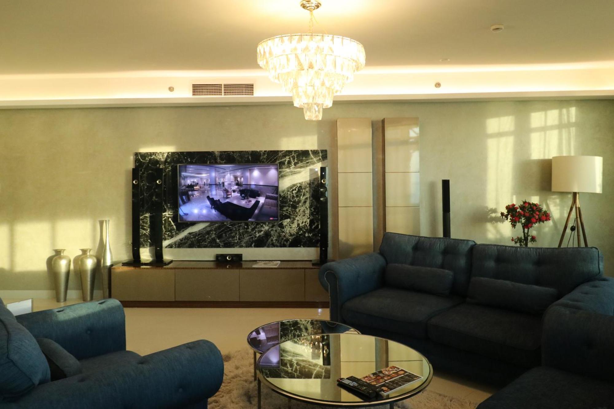 Lagoona Beach Luxury Resort And Spa Manama Exterior photo A living room with a television