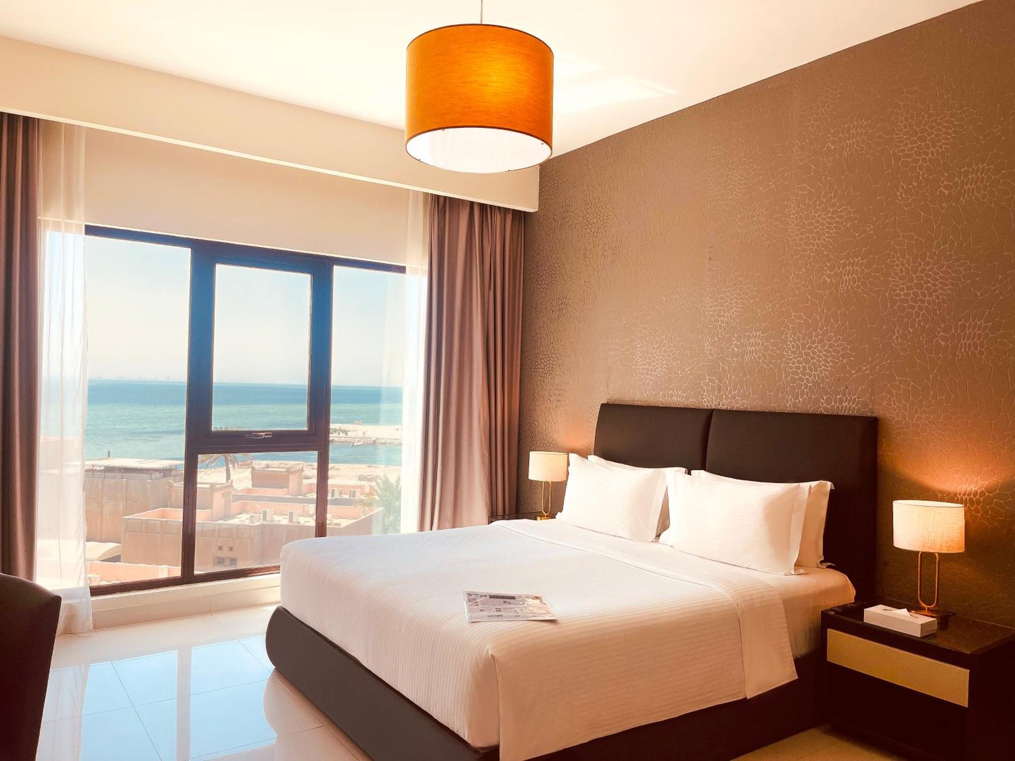 Lagoona Beach Luxury Resort And Spa Manama Exterior photo A bedroom at the hotel